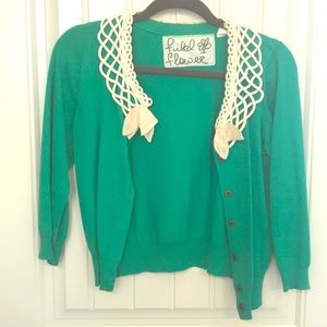 Green crop cardigan with neckline details!